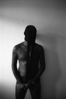 PAT – Unseen, unheard, unexplained - PAT Untitled (Man in Stockings), 2008. Gelatin silver print,23.5 x 16 in (image size), ed. of 7.