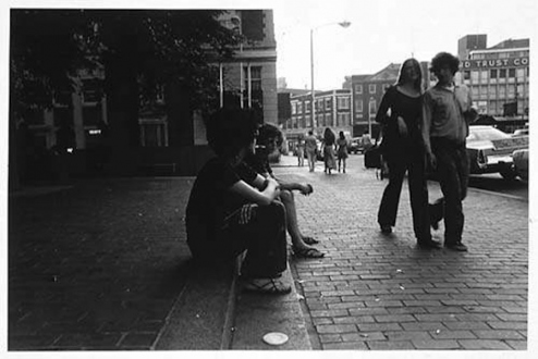 Adrian Piper – The Mythic Being, 1972-1975 - Adrian Piper Cruising White Women #3, 1975. B/W photo documentation of a street performance in Cambridge, MA, 10 x 8 in.