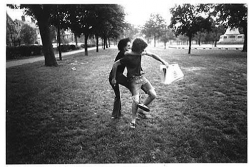 Adrian Piper – The Mythic Being, 1972-1975 - Adrian Piper Getting Back #3, July 1975. B/W photo documentation of a street performance in Cambridge, MA, 10 x 8 in.