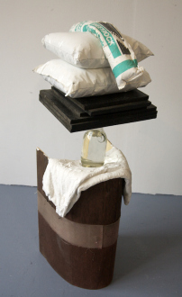 QuietlyLoud – Natasha Conway, Alisha Kerlin, Cassie Raihl - Cassie Raihl, WaterStack, 2010. Wood, plaster, vase, water, plastic, stuffing. 16 x 45 x 13 in.