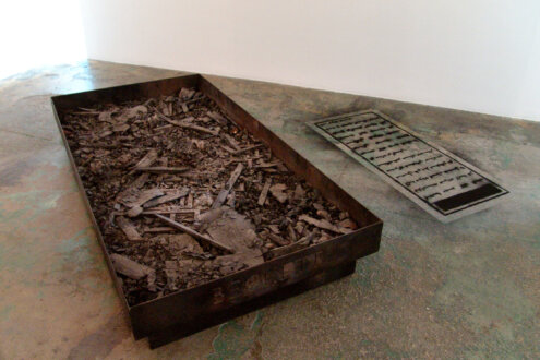 <i>As Dad as Possible, as Dad as Beckett</i>, 2000-2013. Iron, ashes, 79 x 39.5 x 11 in. (pictured with imprint of The Untitled Tomb).