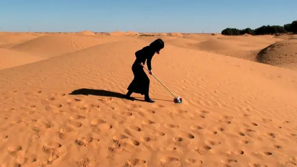 Hanae Utamura (Japanese, b. 1980) Secret Performance Series, 2010-2013 HD Video, 19:70 min. looped Edition of 3 + 1AP + 1EP ©2010 Hanae Utamura. Courtesy of the artist Wiping the Sahara Desert, 2010, 1:04 min, Sahara Desert, Tunisia Casting the Wave, 2010, 1:03 min, Den Haag, The Netherlands Splashing Water at Sahara Desert, 2010, 2:26 min, Sahara Desert, Tunisia Scrubbing the Edge of Salt Lake, 2010, 00:45 min, Chott el Djerid, Tunisia Surrender: Practice for Unconditional Love, 2010, 4:30 min, Leyton Marsh, London Snow Balloon, 2011, 1:29 min, Hämeenkyrö, Finland Red Line, 2011, 1:42 min, Dover, England Wiping the Snow, 2011, 1:45 min, Haukijärvi, Finland When a Line Becomes a Circle, 2013, 6:46 min, Baengnyeongdo Island, South Korea