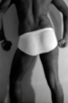 PAT – Unseen, unheard, unexplained - PAT Untitled (Man in White, 1), 2007. Gelatin silver print,19.25 x 13 in (image size), ed. of 7.