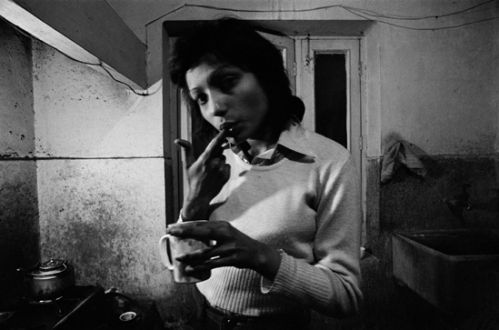 Pablo Bartholomew – Outside In - Veena in My Kitchen at the Jangpura House, 1976. Gelatin silver print, edition of 10 (+3 AP), 16 x 24 in.