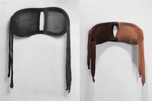 <i>R.S.V.P.</i>, Winter 1976 (original piece). Nylon mesh and bicycle tire, 20 x 26 x 12 in. (installation view <i>Répondez s’il vous plaît</i> Thomas Erben Gallery, 2003; collection of François Pinault).