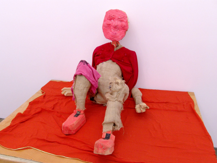 Roza-El-Hassan - Red Man, 2006. Wood, fabric and mixed media, 33 x 34 x 43 in.