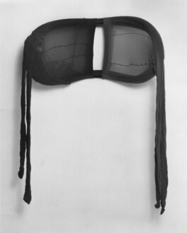 <i>R.S.V.P.</I> winter 1976 (original piece/documentation)
Nylon mesh and bicycle tire,
20 x 26 x 12 in.
Recreated for <i>Répondez s’il vous plaît</i>, 2003 at Thomas Erben Gallery. In the collection of François Pinault.