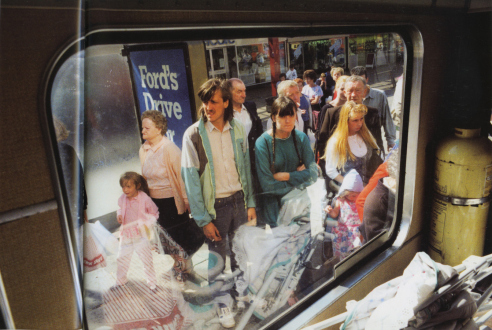 Tom Wood – The Bus Project - Strand Shopping Centre - Bootle, 1989. C-print, 12 x 18.5 in, edition of 6 (+1 AP).