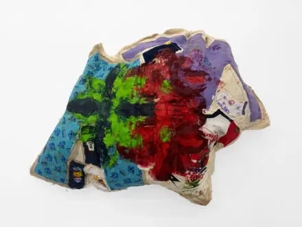 Mike Cloud, <i>Green Poinsettia Quilt,</i> 2008. Oil and clothes on canvas bag, 56 x  36 x  9 in.
